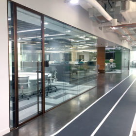 Project: Dubai Holdings | Product: Revolution 100 w/ Edge Symmetry Doors
